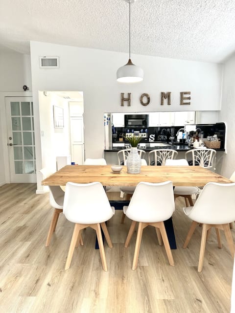 View of dining room and kitchen. 