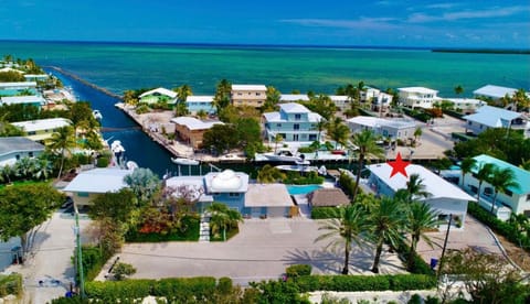 Aerial view. See red star. Ocean access. 