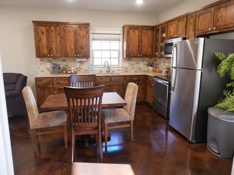 From the laundry room looking out into the kitchen