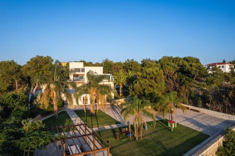 An outdoor play area can be discovered within the lawned grounds. With a swing set, slide and playhouse, children are bound to have fun.