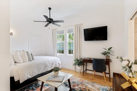View of the queen bed and living space