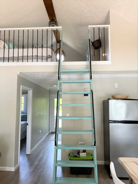 Ladder to lo
ft bedroom with king sized bed