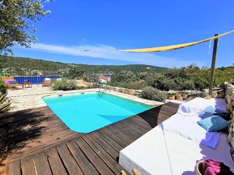 Pool. Villa Luna view from the pool to the bay