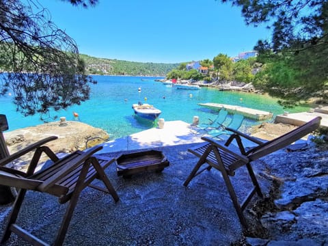 Area that directly surrounds the property. Villa Luna beach and the boat for rent