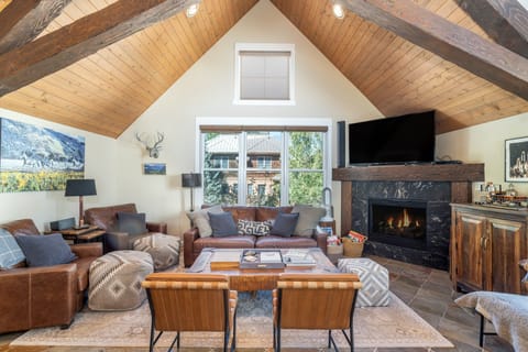 Such a cozy gathering spot in the great room with a fireplace.