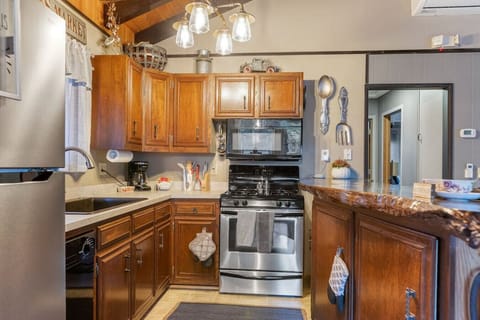 Open concept kitchen and breakfast bar.