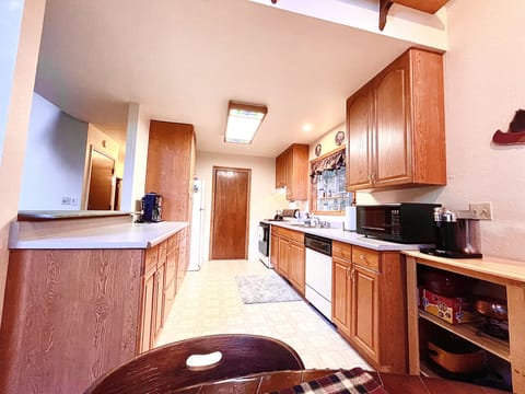 Kitchen includes refrigerator/ Freezer, gas stove and Dishwasher
