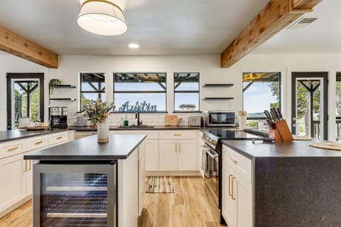 Cook up a storm in this beautifully designed and well-lit kitchen.