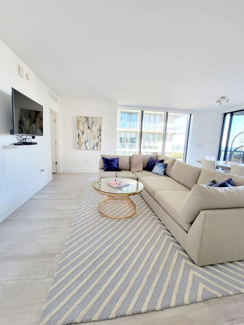 Large common space with tons of natural light from the floor to ceiling windows