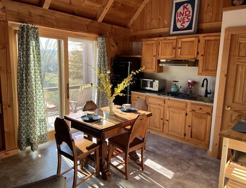 Dining and kitchenette with awesome views of  CT's rolling hills.

