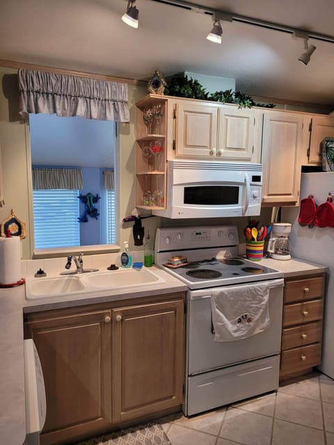 Flat top stove and convection / microwave oven as well as a regular oven.