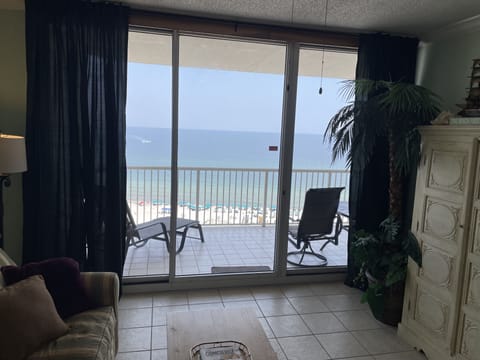 Replaced heavy blinds with easy to adjust dark curtains.