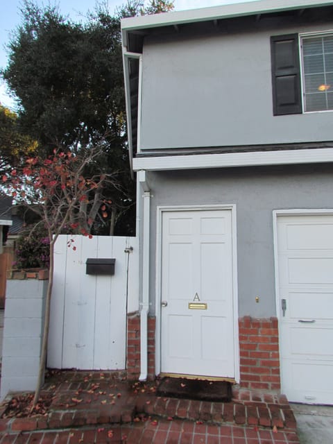 Private Entrance to 1Br/1Ba unit is to left of garage