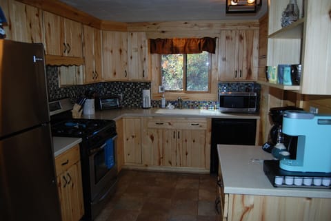 The fully equipped kitchen awaits your arrival.