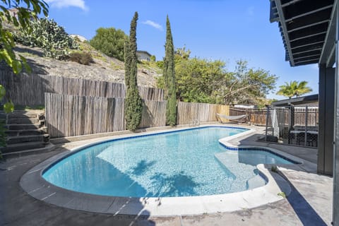 Giant pool with safety gate, seating, solar heat, gas heat for $100/day.