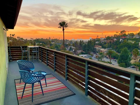 A large deck offers sweeping views of one of LA's most vibrant neighborhoods.