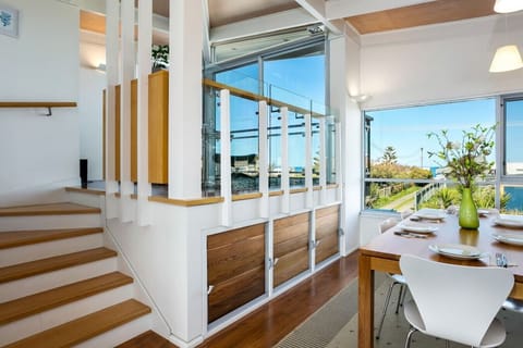 Gather around the kitchen table and enjoy the seamless flow to the upstairs spaces.
