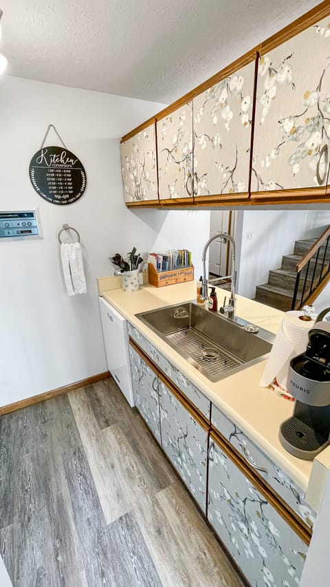 Galley style kitchen is fully equipped with a Keurig coffee maker and toaster.