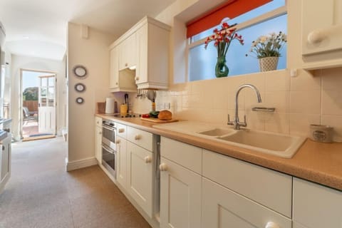 Ground floor: Galley kitchen with plenty of cupboard space