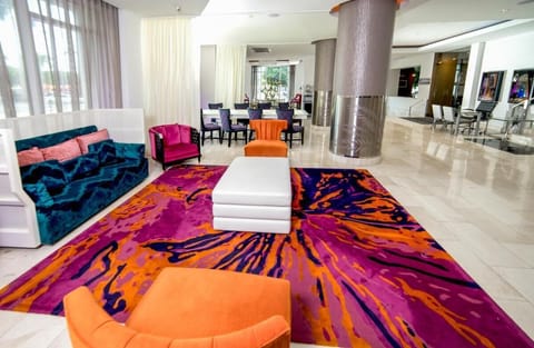 Kick back in a colorful lobby lounge made for mingling.