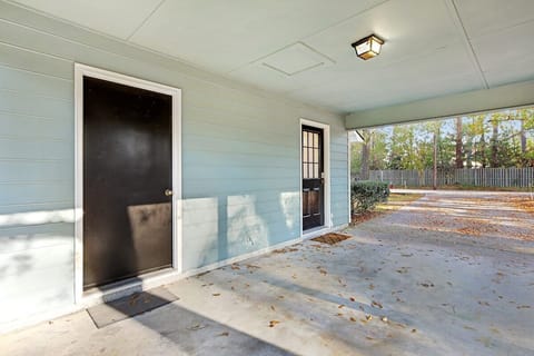 A view of the carport and entry to the home