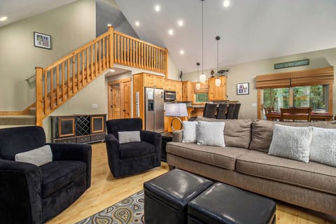 Main Floor Living Space - Main Floor Living Area showing open floor plan into the kitchen and dining area and stairway to the Loft