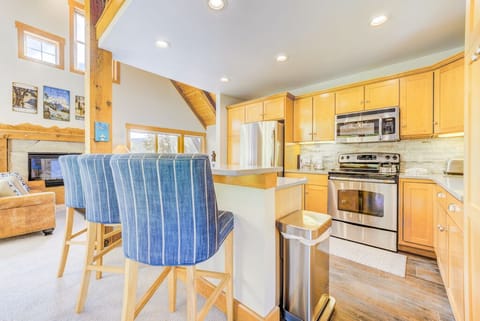Breakfast bar with seating for three.