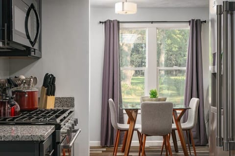 Indoor kitchen near dining area