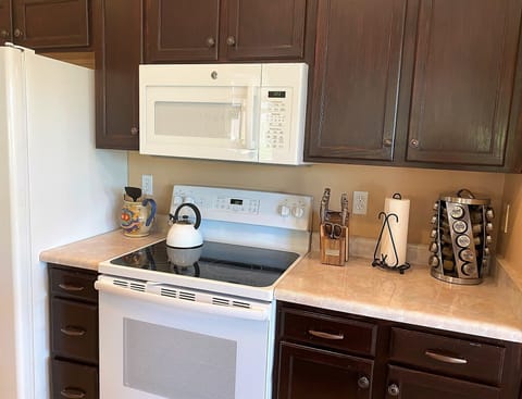 Kitchen with full-sized stope