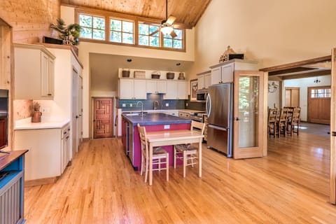 View of kitchen & garage entrance from sitting area