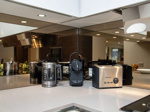 Kitchen Appliance, Kitchen, Interior Design, Countertop, Small Appliance, Lighting, Home Appliance, Ceiling, Light Fixture, Coffeemaker