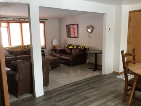 Looking at living room from kitchen/dining area.