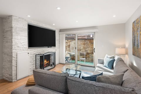 Evenings will be enjoyed by all as you relax on the comfortable sofa in front of the wood burning fireplace and large TV.