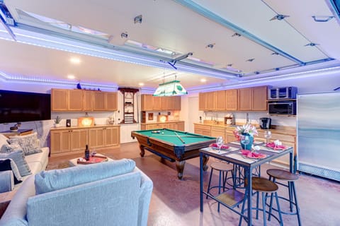 Great room with Billiard or Ping Pong, Quee Sofa Couch, 75" TV, dining table wit