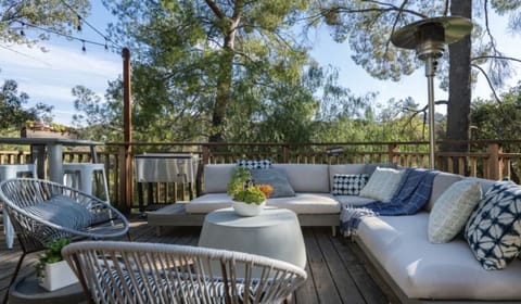 Zen deck offers majestic views and sounds of nature. Perfect gathering spot.
