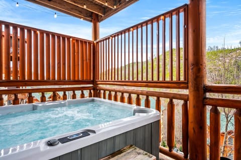 Your Hot Tub Retreat! Soak in tranquility while enjoying breathtaking mountain views!
