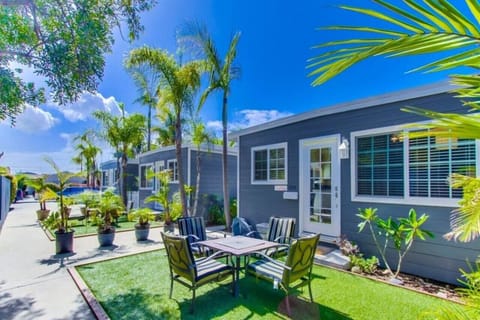 Cottage 3 has a nice front yard turf with firepit