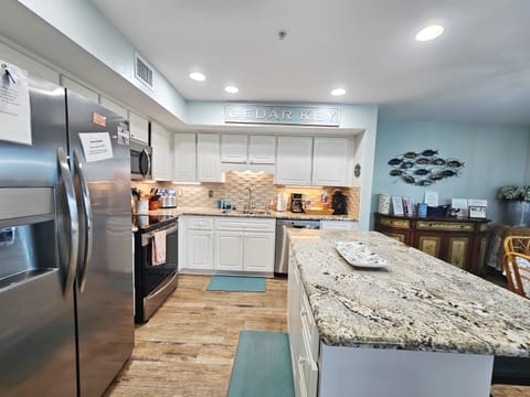 Full Kitchen Stocked with Dishware and Coffee
