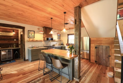 Hickory Floors, Custom Bar Area, Large Pantry and fully stocked kitchen!