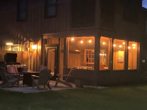 Private Screened Porch and patio facing the Squam Channel & docks