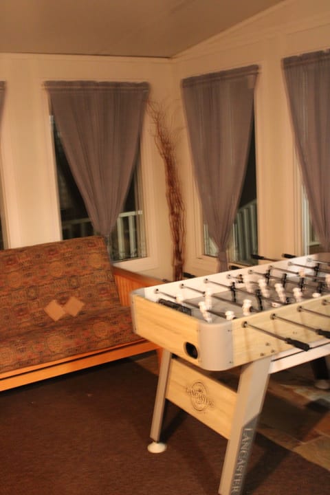 Foosball table in the sunroom