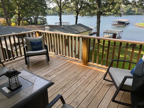 Outdoor seating, gas grill and fire pit…with a beautiful lake view!