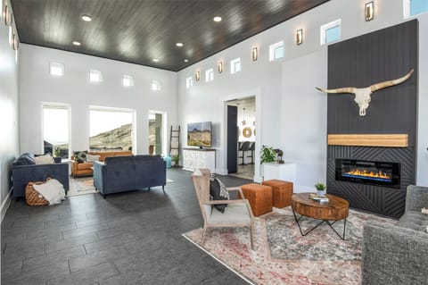 Enjoy the gas fireplace in the Main Great Room with views of the Salt Flats!