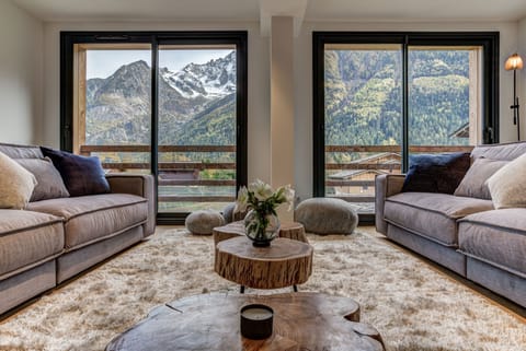 Living room with floor to ceiling windows