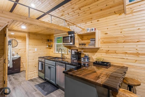 Stove, Dishwasher, Microwave, Toaster, Keurig Coffee Maker, and a Blender await to make cooking a breeze.