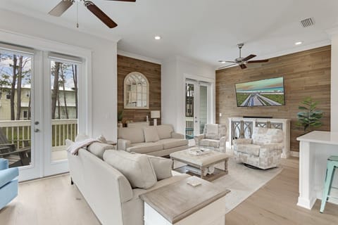 This spacious living room is ideal for a large group to gather and relax.