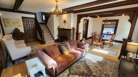 Living room, box beam ceiling, gas fireplace.