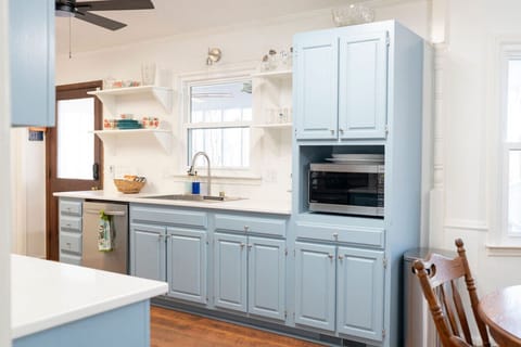 A classic, fully equipped kitchen — everything you need to cook and connect.