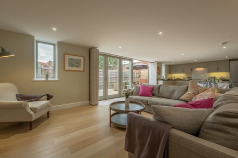 Ground floor: Sitting room with french doors leading to the enclosed garden