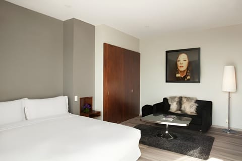 bedroom with coffee table and sofa